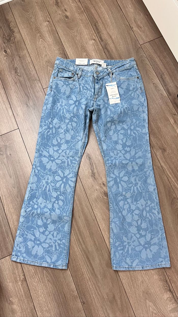 Jean flare fleuri