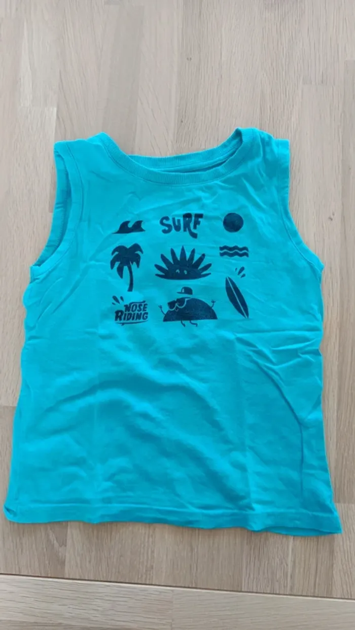 Tee shirt sans manches débardeur bleu Kiabi 5 ans