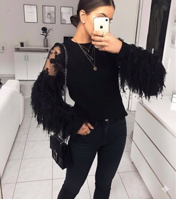 Pull à franges en laine noir