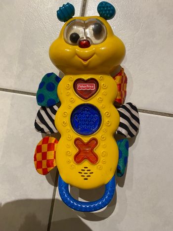 Chenille musicale Fisher Price très bon état vintage