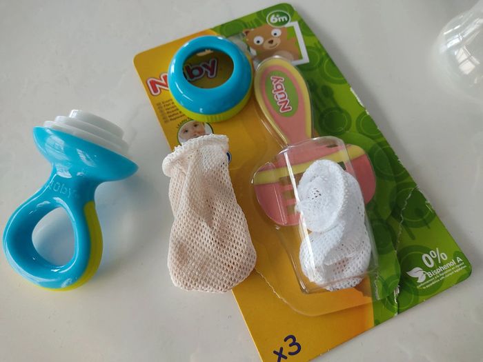 Grignoteuse Nuby + 1 filet de rechange - photo numéro 2