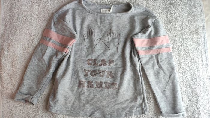 Pull gris et rose orchestra