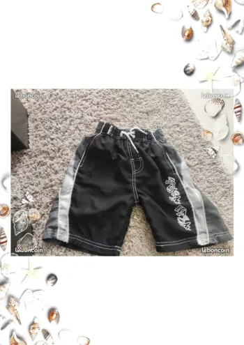Short noir et blanc taille 7 8 ans rebel surf