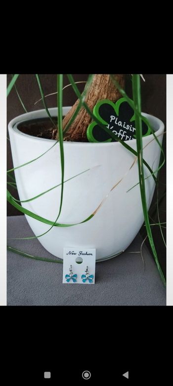 Boucles d'oreilles nœuds bleus