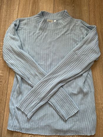 Pull col montant