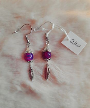 Boucles d'oreilles plume violette