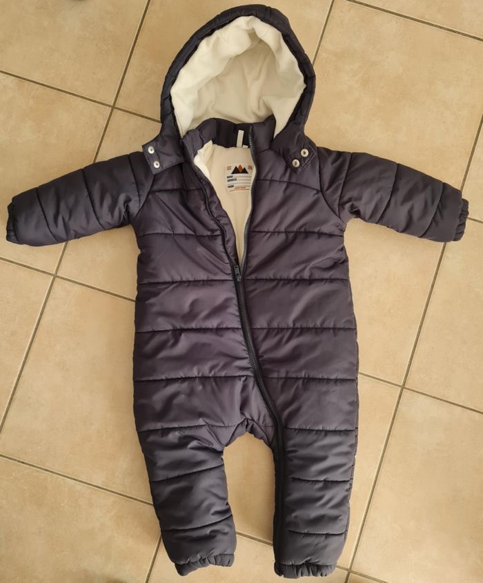 Combinaison Pilote état neuf 18 mois