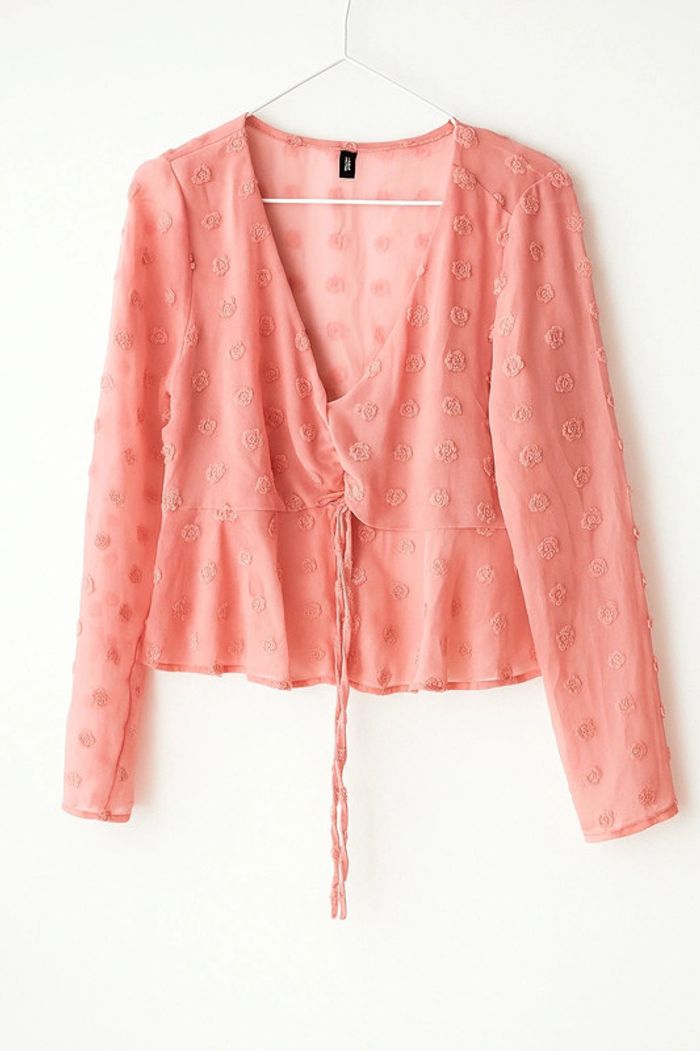 Haut rose pâle
