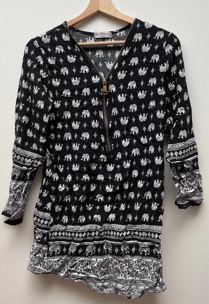 Blouse manches longues noire avec motifs éléphants blancs