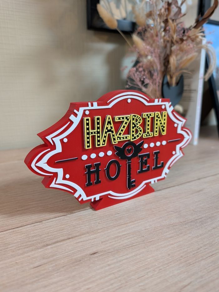 Hazbin Hotel logo décoratif 21x12cm Excellent état - photo numéro 3
