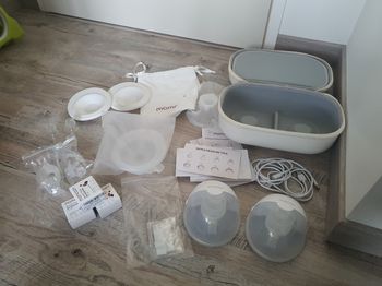 Momcozy m5 tire lait main libre