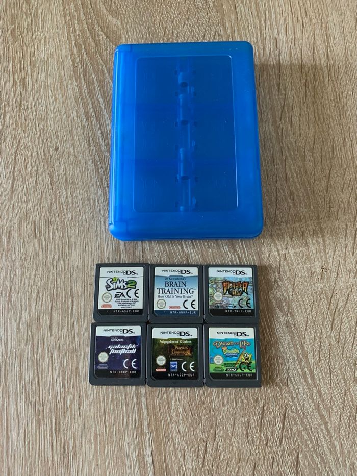 Lot de jeux ds + une boîte de rangement des jeux - photo numéro 2