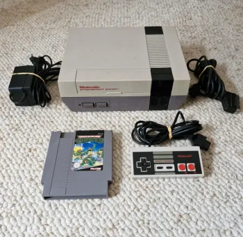 Console Nintendo nes et jeu tortue ninja tmnt en loose