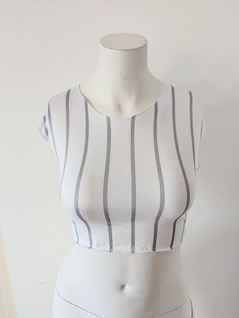 Top court sans manches a rayures taille l 40