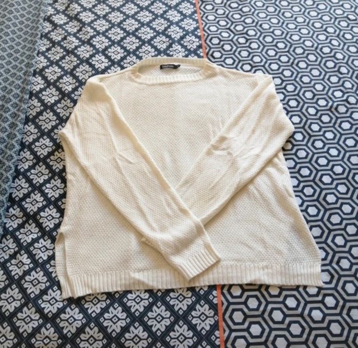 Pull en laine couleur crème