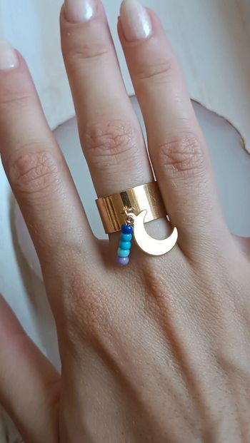 Jolie bague à breloques en acier inoxydable