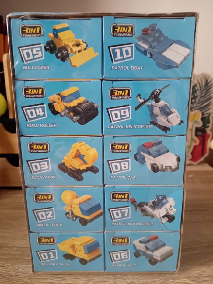 Lot de 10 boîtes de lego brick police et engin de chantier neufs