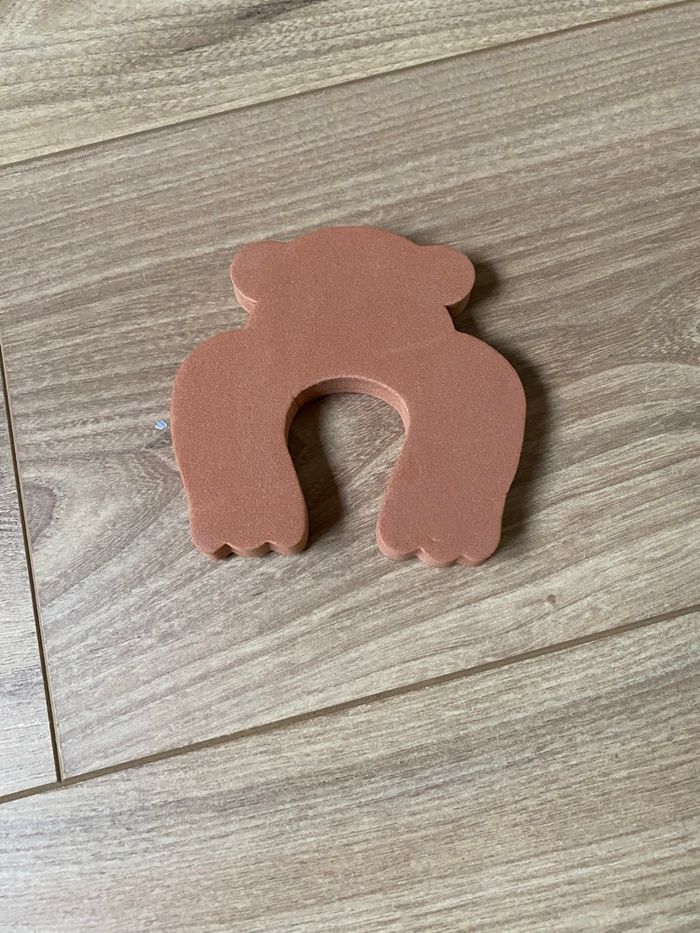 Cale porte protège doigts pour enfant