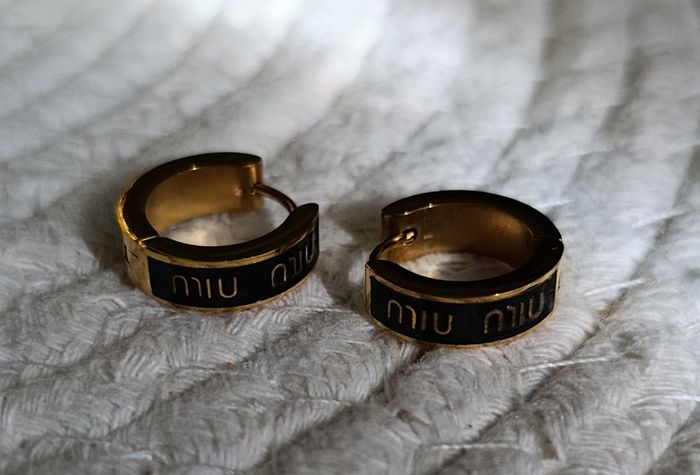 Boucles d oreilles miu miu - photo numéro 3
