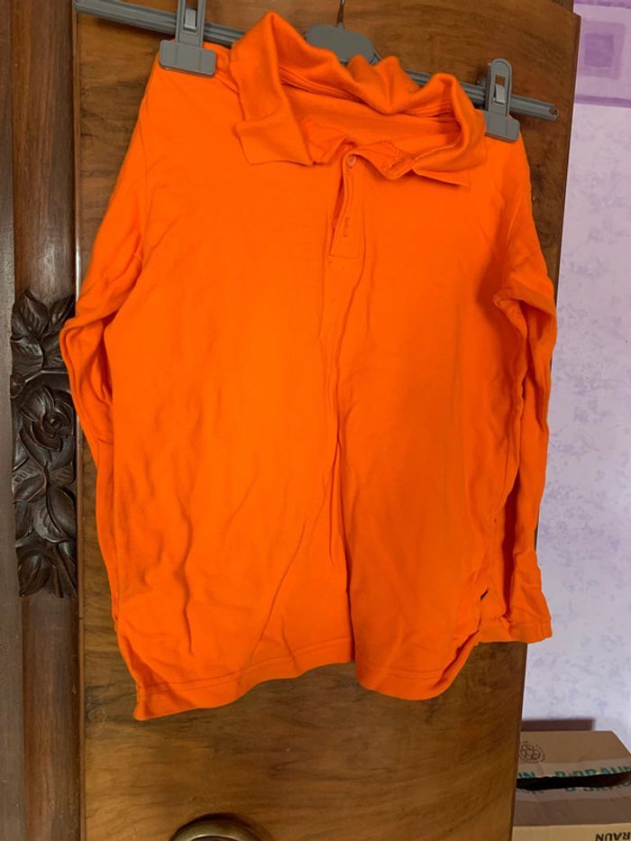 polo manche longue orange vif 8 ans