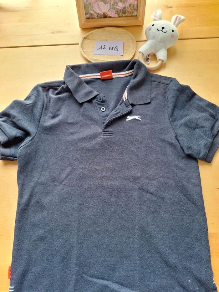 Polo manches courtes pour Garçon taille 12 ans très bon état