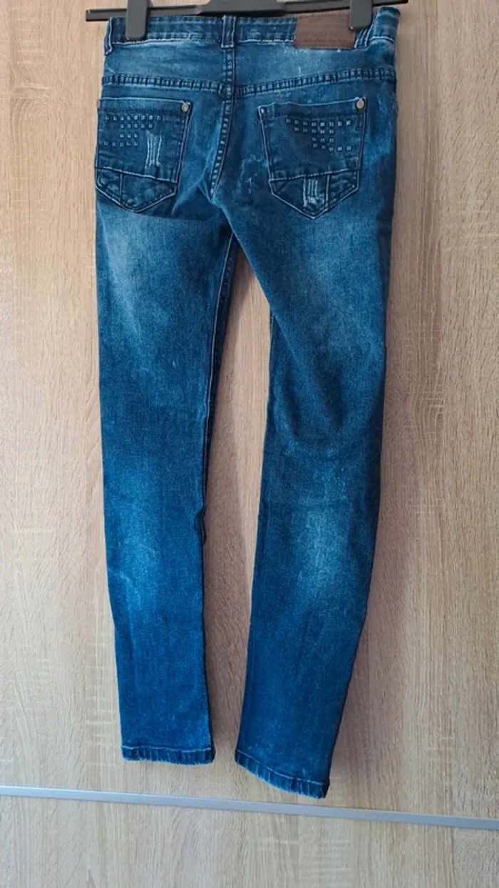 Jeans effet délavé déchiré - photo numéro 3