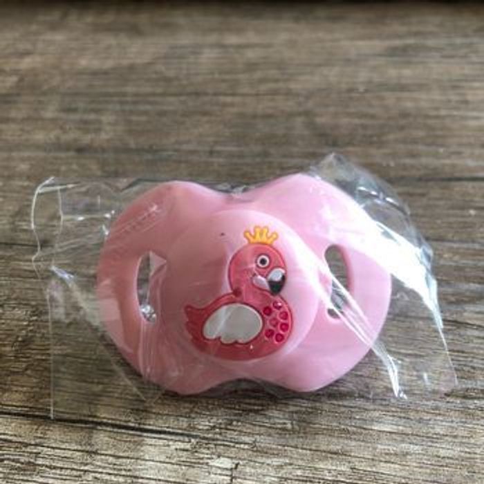 Tétine flamant rose