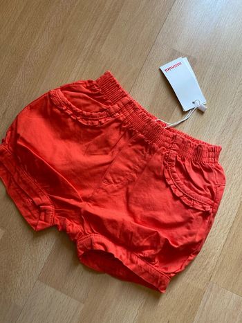 Short Catimini , couleur mandarine, taille 12 mois Neuf valeur 39,00 €