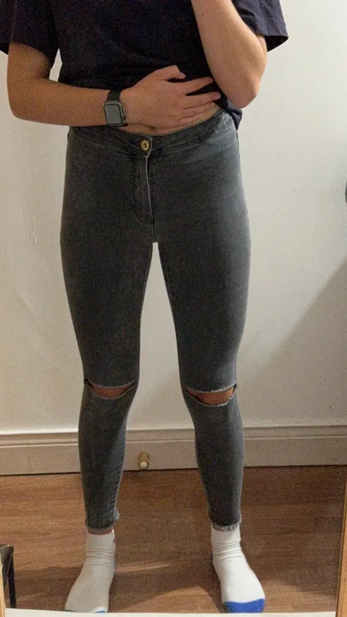 Jean skinny noir troué