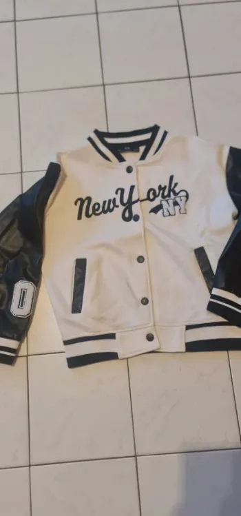 Blouson mi saison. 9/10ans