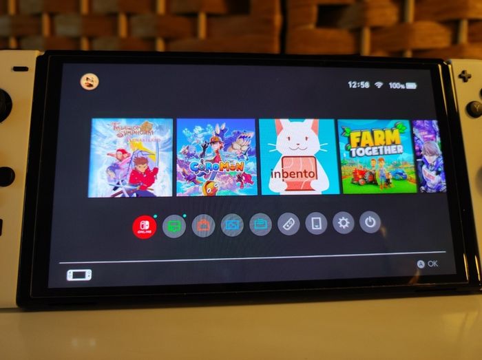 Console Nintendo Switch OLED Blanc 64Go + 2 Jeux + Sacoche + Carte Micro SD - photo numéro 6