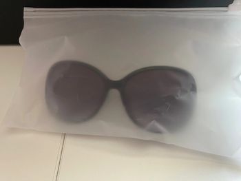 Lunettes de soleil noir motif doré