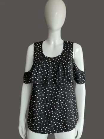 Blouse noire à pois blanc