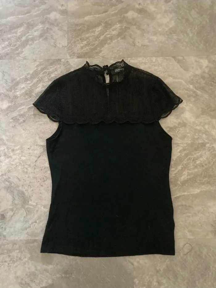 Tee shirt Lulumary taille 42/44 en bon état