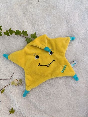 Doudou Pampers peluche en forme d'étoile