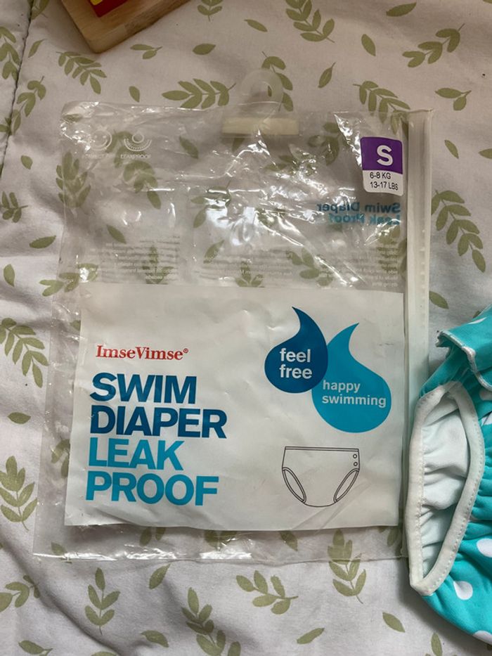 couche de piscine lavable turquoise a pois blanc 6/8 kg environ 6 mois - photo numéro 3