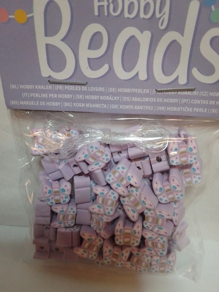 Perles de loisirs "Papillons" violets + fil - photo numéro 2