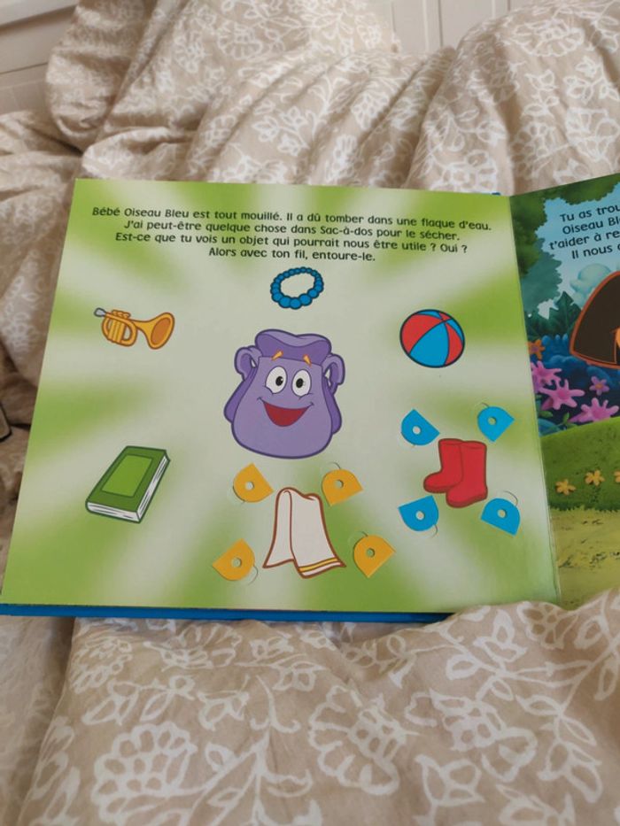 Livre Dora et bébé oiseau bleu - photo numéro 2