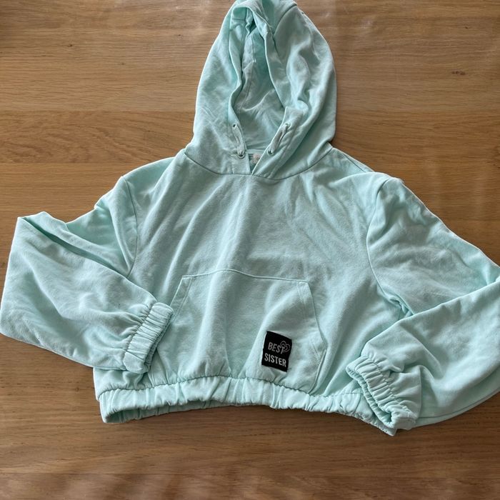 Pull à capuche