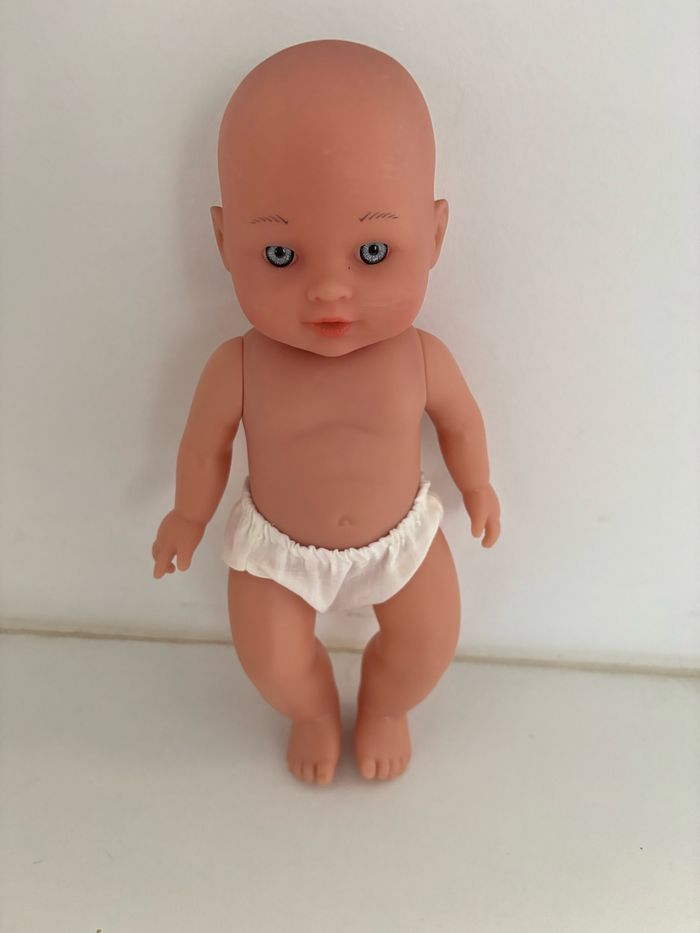 Poupon yeux bleus 27cm