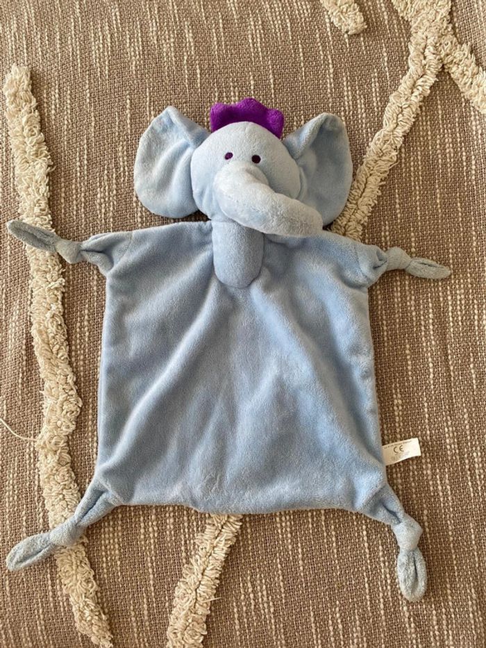 Peluche doudou plat 32cm Luc et Léa Éléphant bleu et violet trés bon état