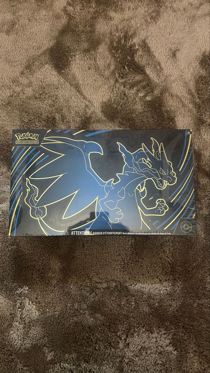 UPC Flammes Fantasmagoriques Mega Dracaufeu parfaitement scellée