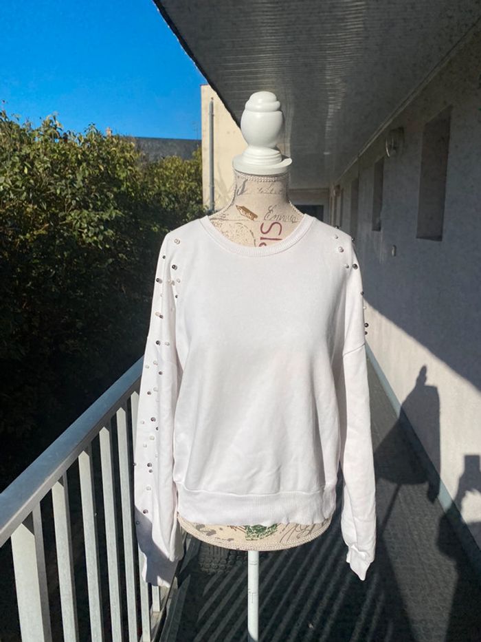 Pull blanc pollué taille S