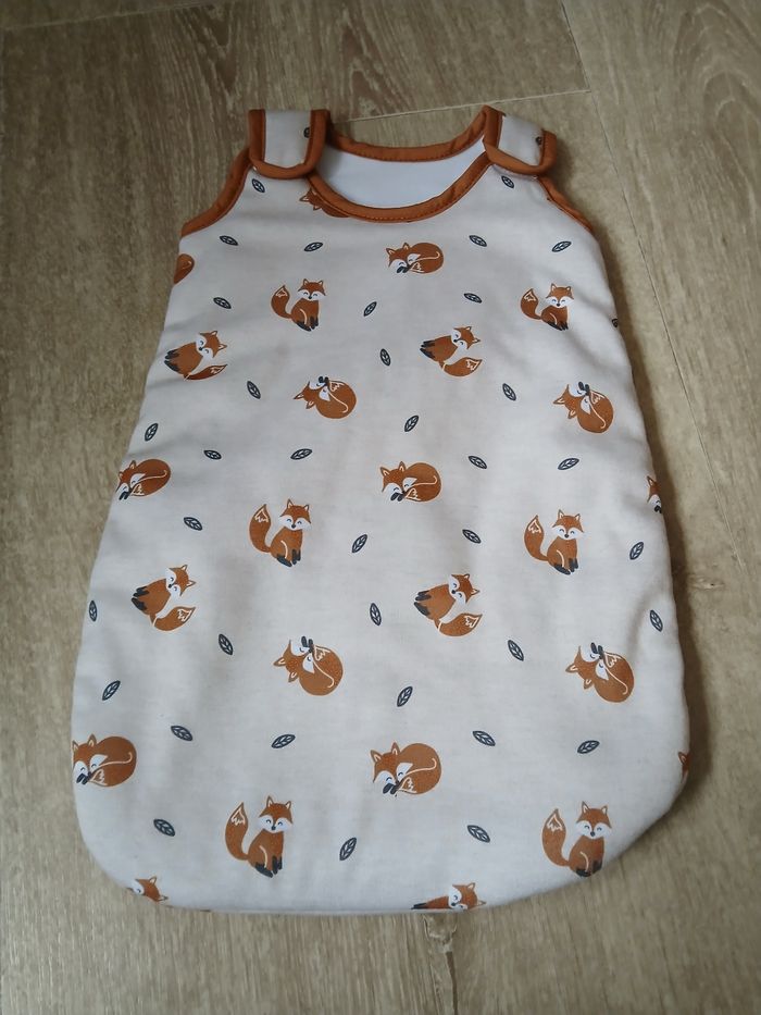 Jouet gigoteuse poupon renard neuve