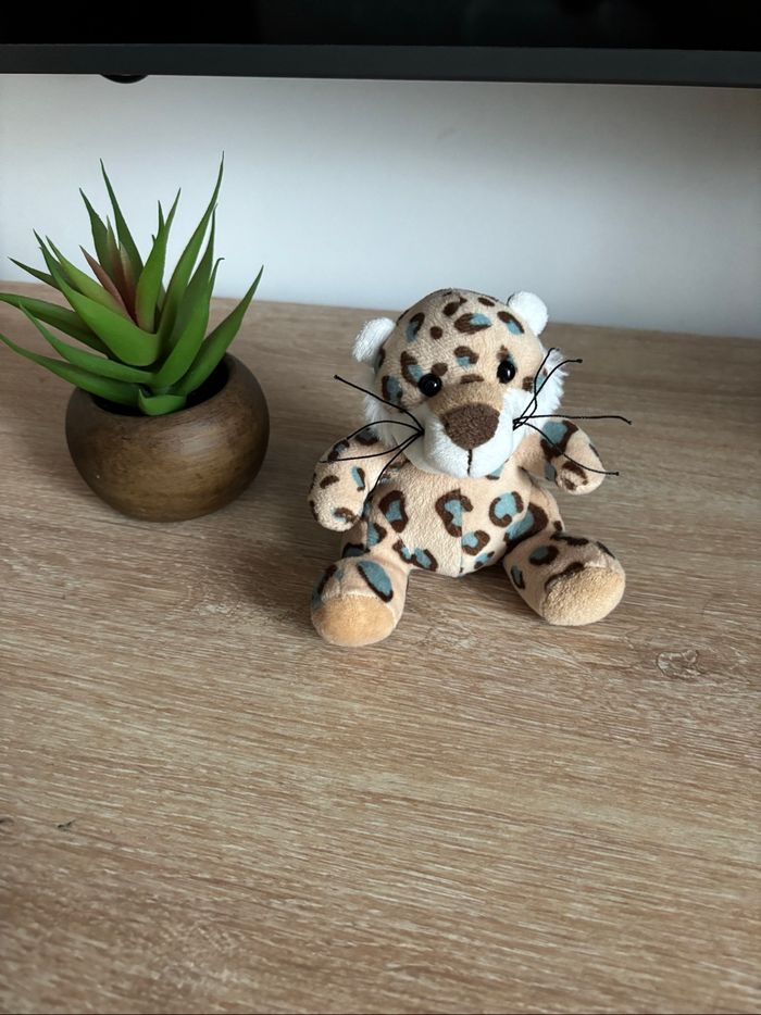 Petite peluche léopard tacheté bleu