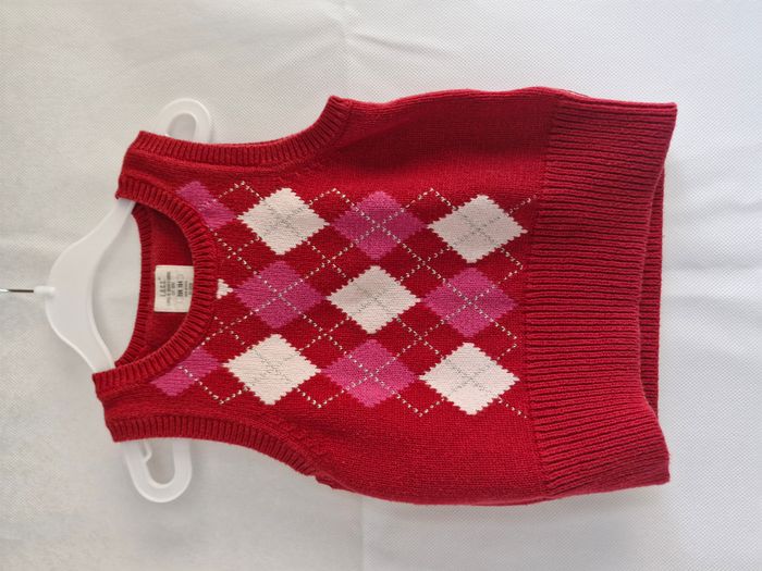 Pull sans manches 104 cm H&M – l.o.g.g Rouge avec losanges rose, blanc et argentés