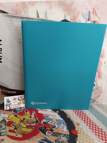 PHOENIX SHIELD - Album bleu turquoise - 396 places - NEUF