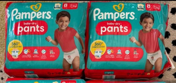2 paquets de couches Pampers taille 8