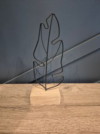 Bibelot plume en métal 