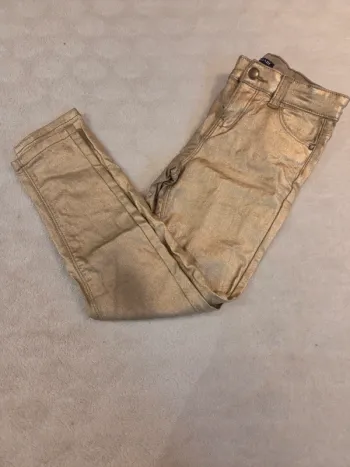 Pantalon enduit doré